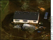 Officers found the bodies of six family members when they entered this house outside McMinnville, Oregon, Thursday night.